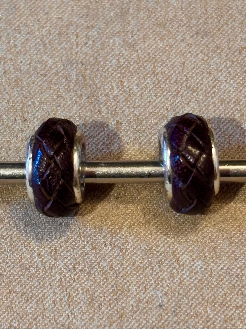 Two Brighton Baja beads Braided dark brown leather between Silver edges Retired